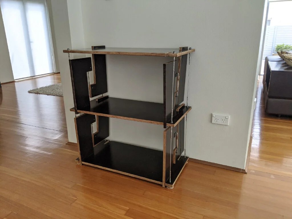 The functional appearance model of the tensegrity shelving made from form plywood and finished with beeswax polish