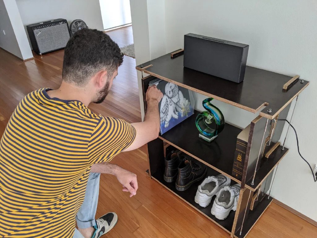 Heavy items were placed on each shelf to test the strength and tension of the model.