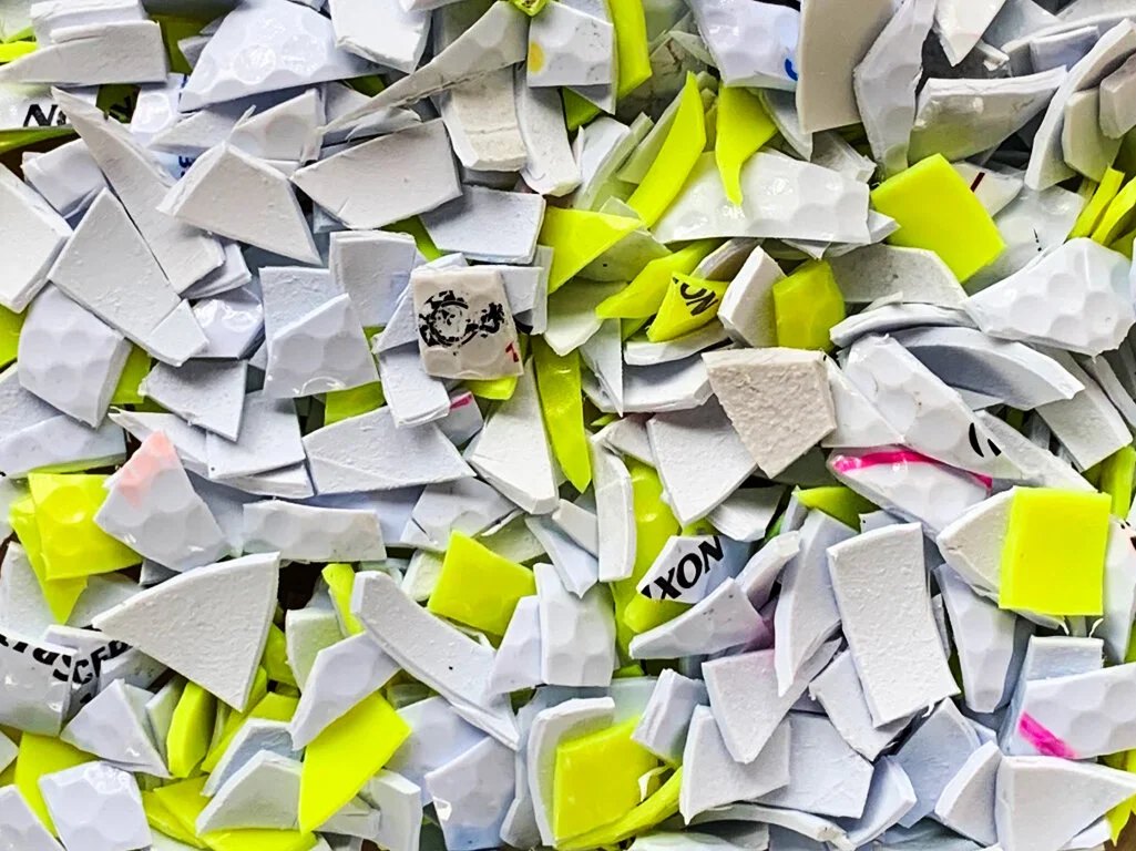 The golf balls are then shredded into small ‘chips’ using the same hydraulic press
