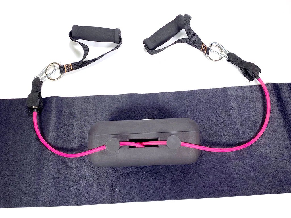 Dual resistance bands setup adjusted to the user's preference and connected to compartment ready for use.