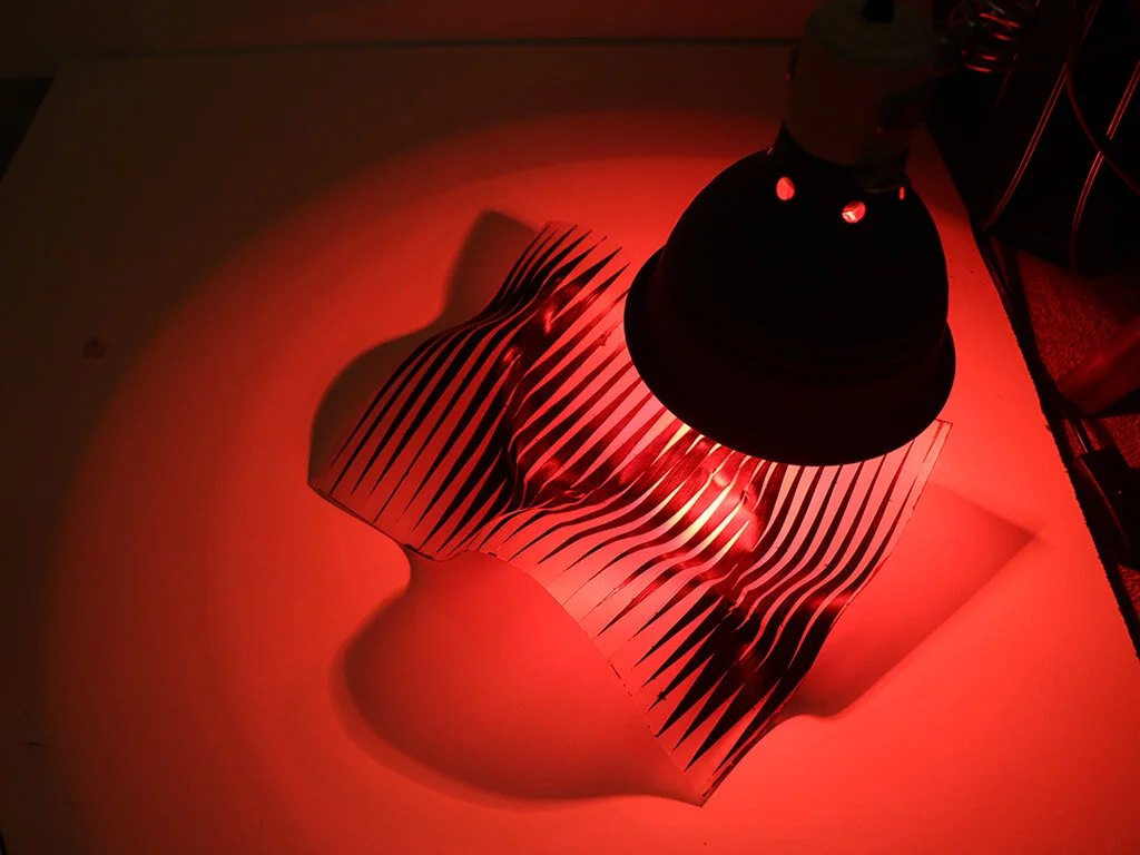 The high impact polystyrene material during the activation process which occurs under an infrared light.