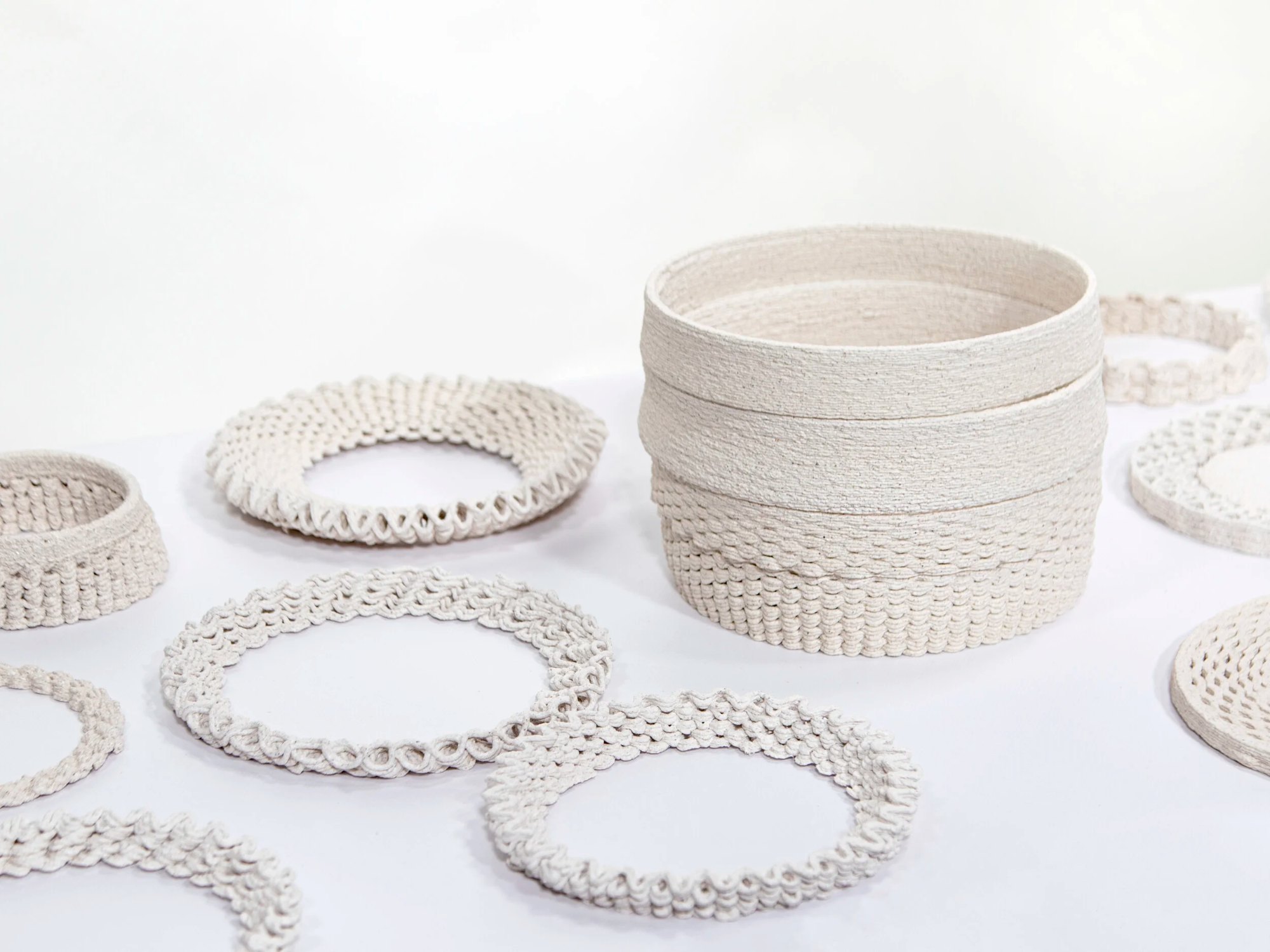 Cured material samples; the speckled, clay like material is made from oyster shells and agar.