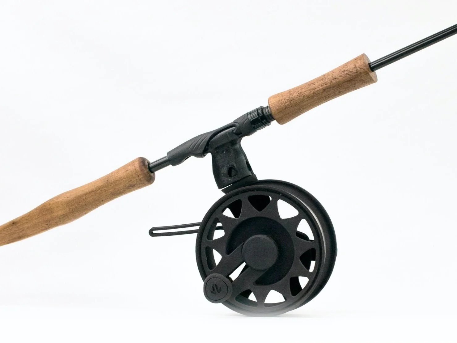 Tomorrow’s Catch reel, paired with a handcrafted rod highlighting its aesthetic qualities. The rod blank is formed from graphite with the hand grips turned from Tasmanian Oak