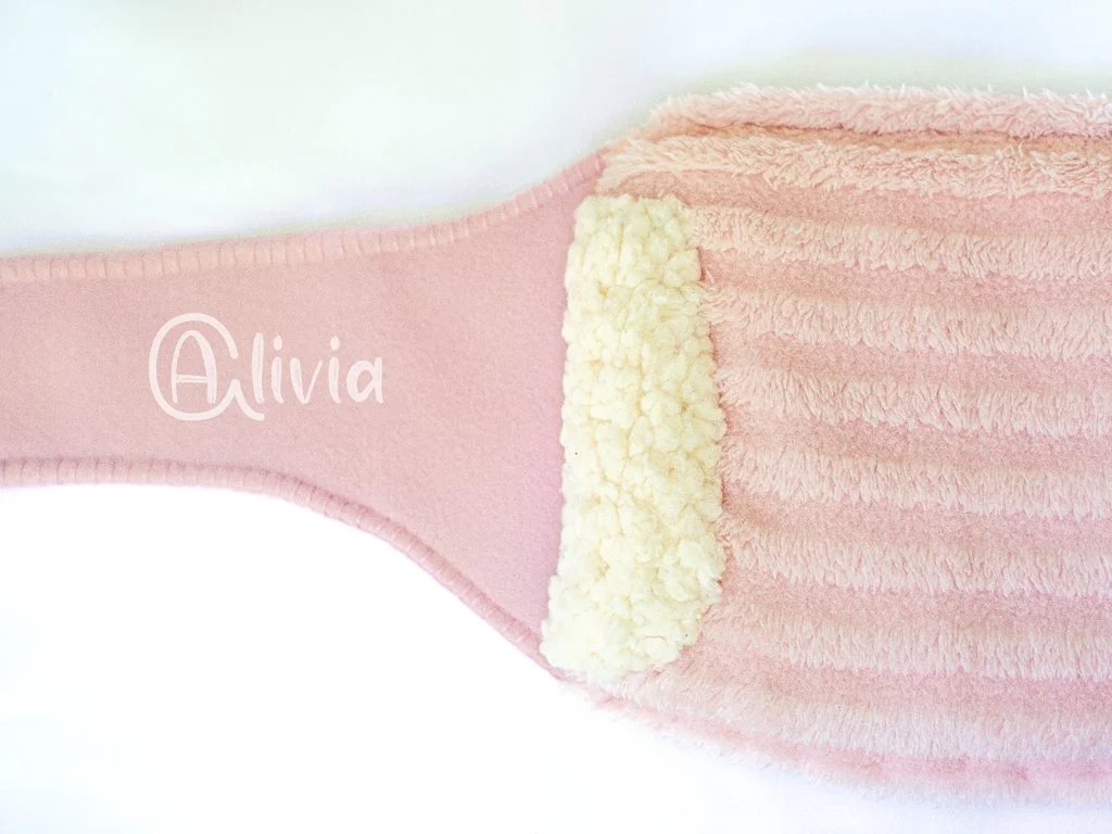 The model presenting where the logo design would be embroidered on the strap.