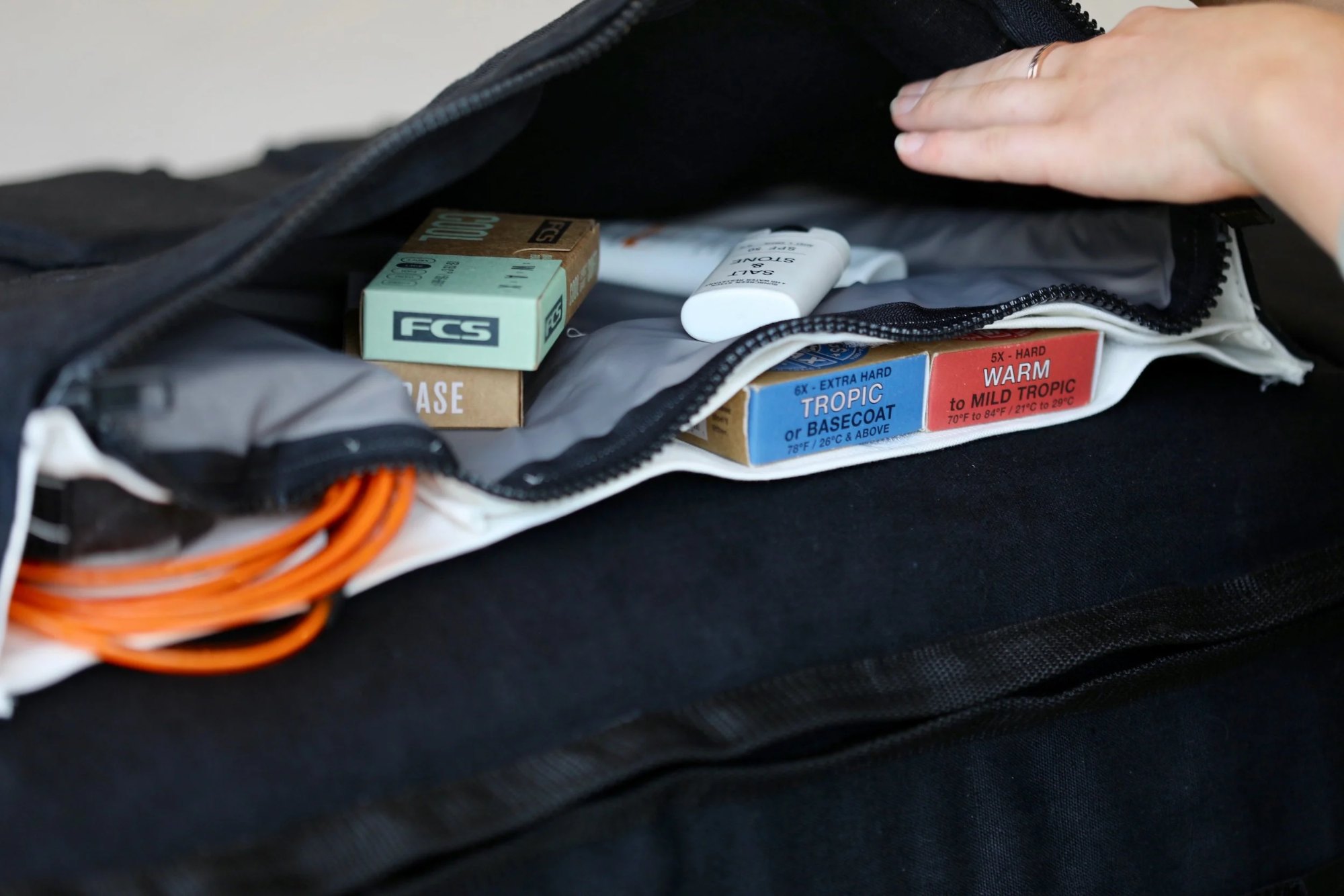 User accessing the exterior pocket