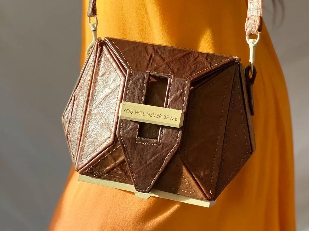 Detail of the bag showing the timber hardware.
