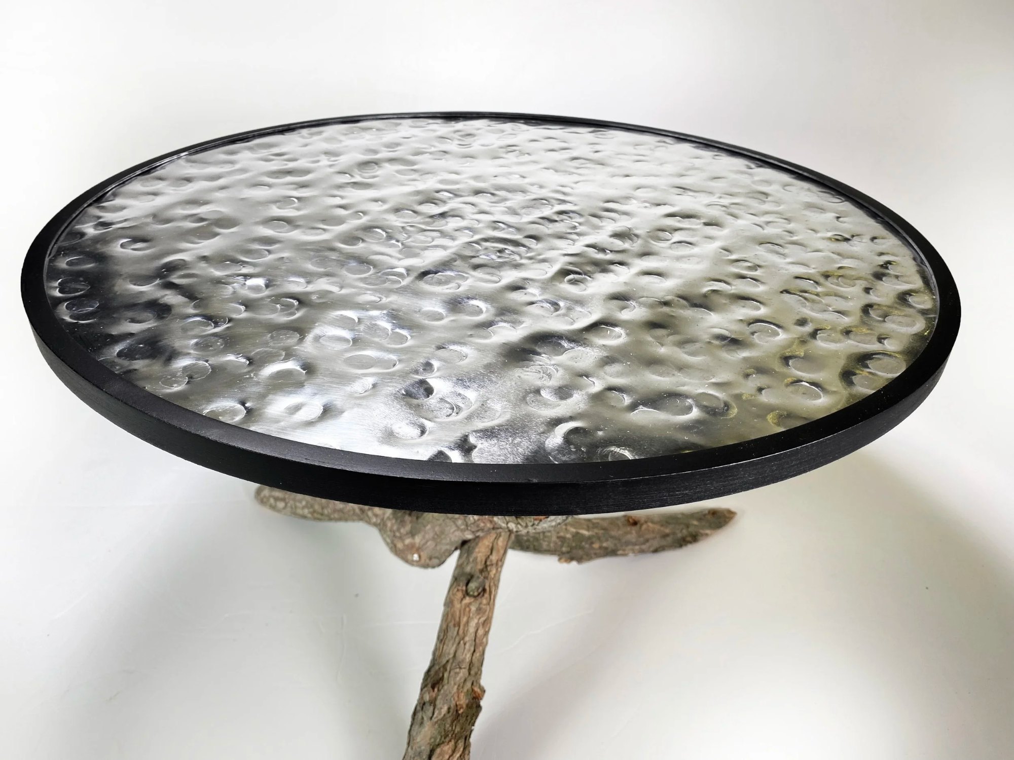 Top shot of battered aluminium surface