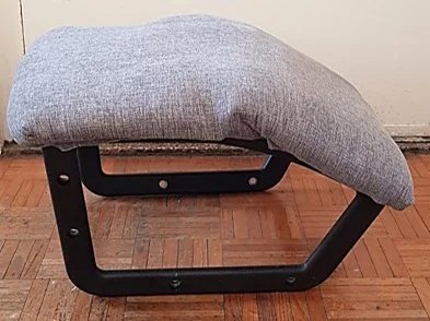 An exploration of the re-making an office chair into another piece of furniture incorporating reuse of armrest components, plywood and seat foam.