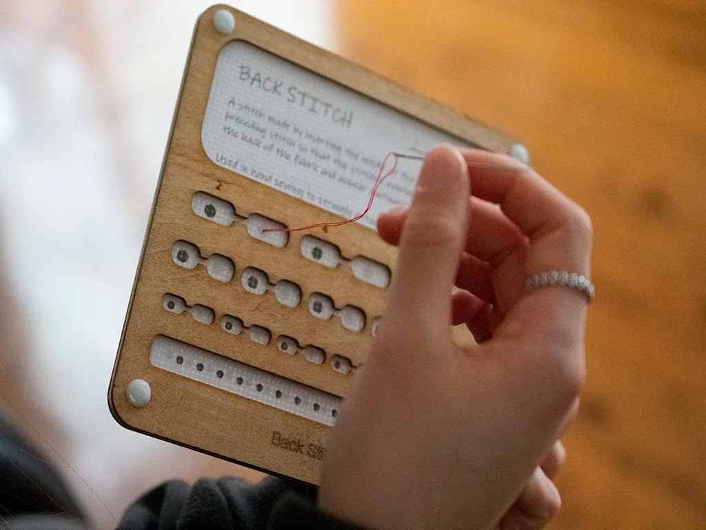 User interacting with the back stitch template