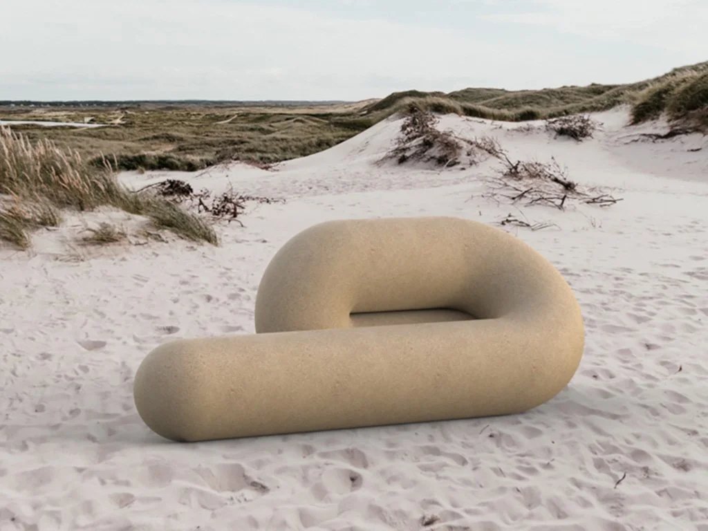 In-context render of the chaise longue on the beach