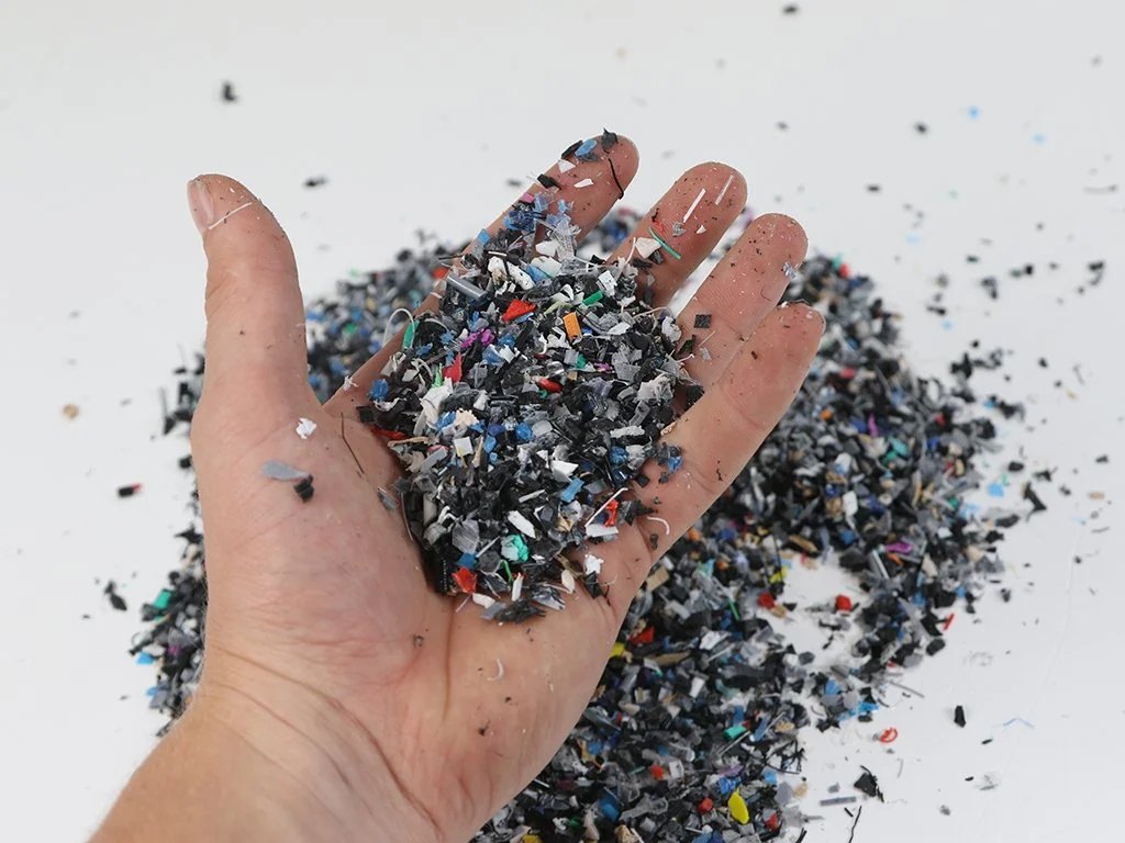 Shredded PLA waste used to make the frame of the chair.