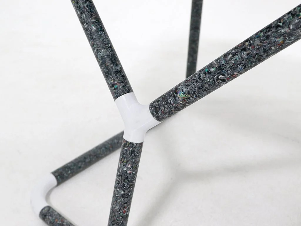 Recycled PLA rods connected via 3D printed connection pieces.