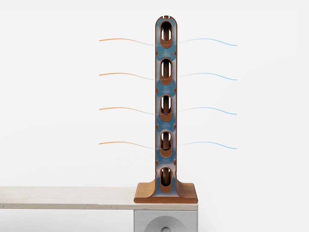 A sectional view from the front of the terracotta divider. Water from inside moves through the porous, unglazed terracotta walls, evaporates, and is transformed into water vapor by the heat of the air. This reaction absorbs heat from the surrounding air, cooling the water, the material itself, and thus the air in the surrounding space.