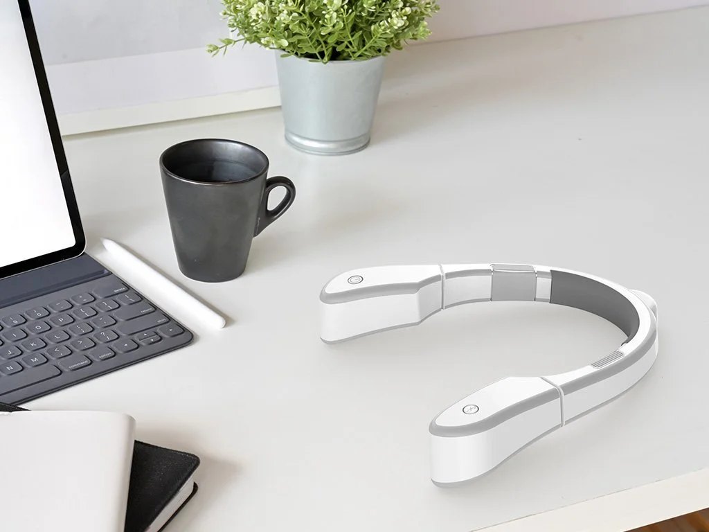 In-context rendering of Conscious Wearable on a desk
