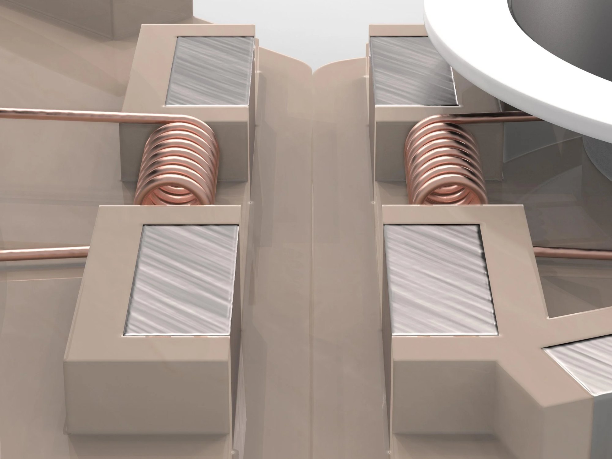 The current in the central module passes through coils, creating a changing electromagnetic field. When a piece is connected to the central module, this electromagnetic field induces a current in its corresponding coil.