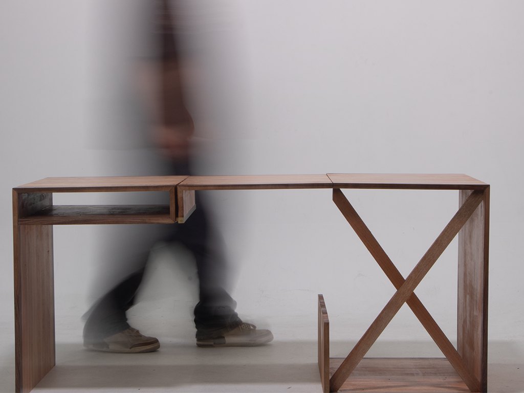 Front on views of the table in use, going from expanded to compact forms