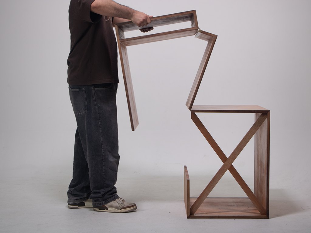 Front on views of the table in use, going from expanded to compact forms