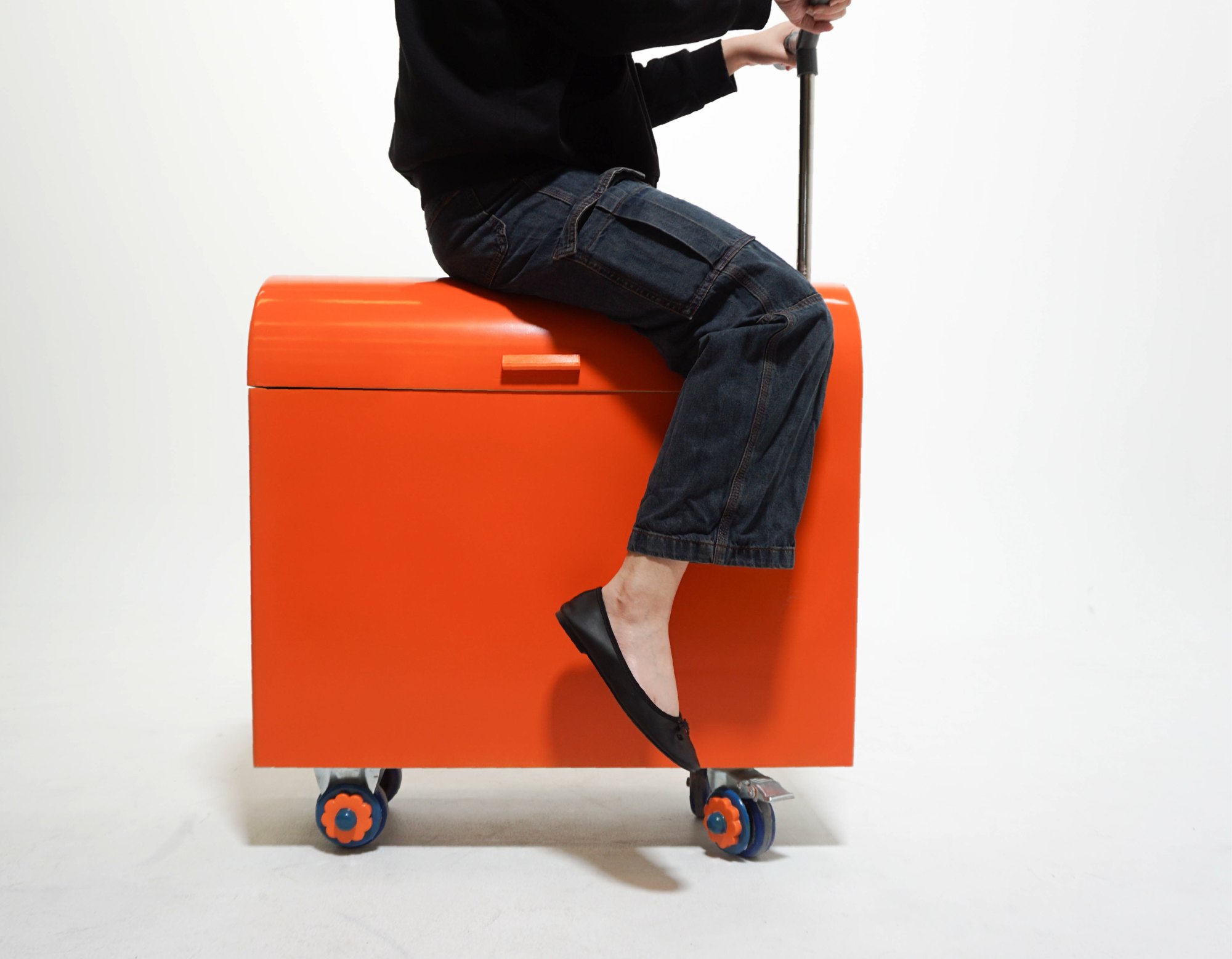 User riding the scooter to their office desk
