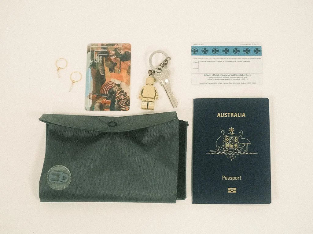 SAFE medium pouch with passport, identification, jewellery and a key.