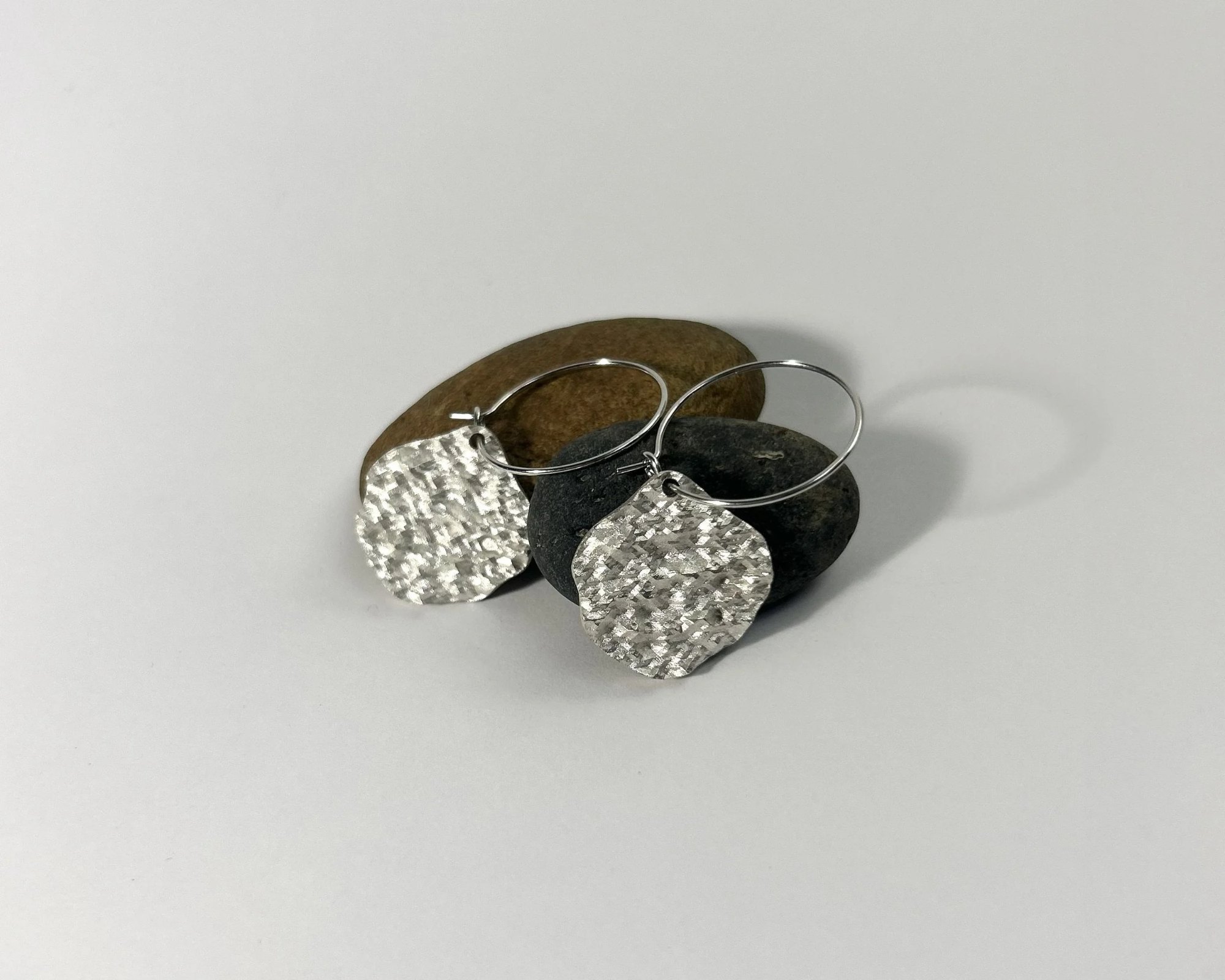 Closeup of sound-distorted earrings