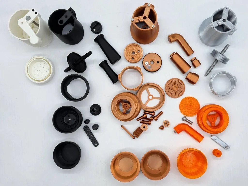 Prototyping: 4 main 3D-printed models (some with variations) were used to refine the design before the final stainless-steel prototype.