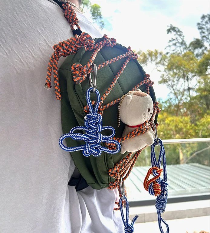 Knot-Pod being worn over the shoulder.
