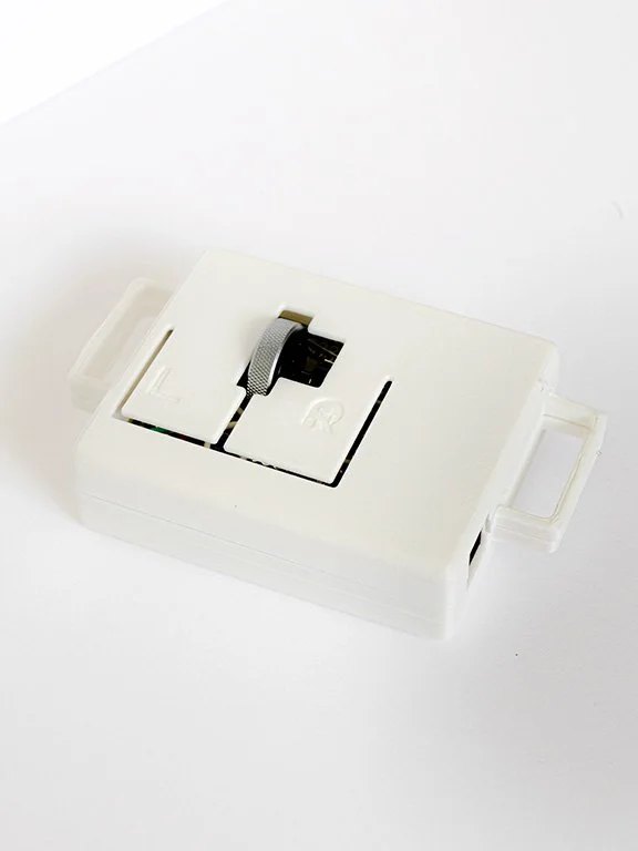 Product image of the KomPac Mouse.