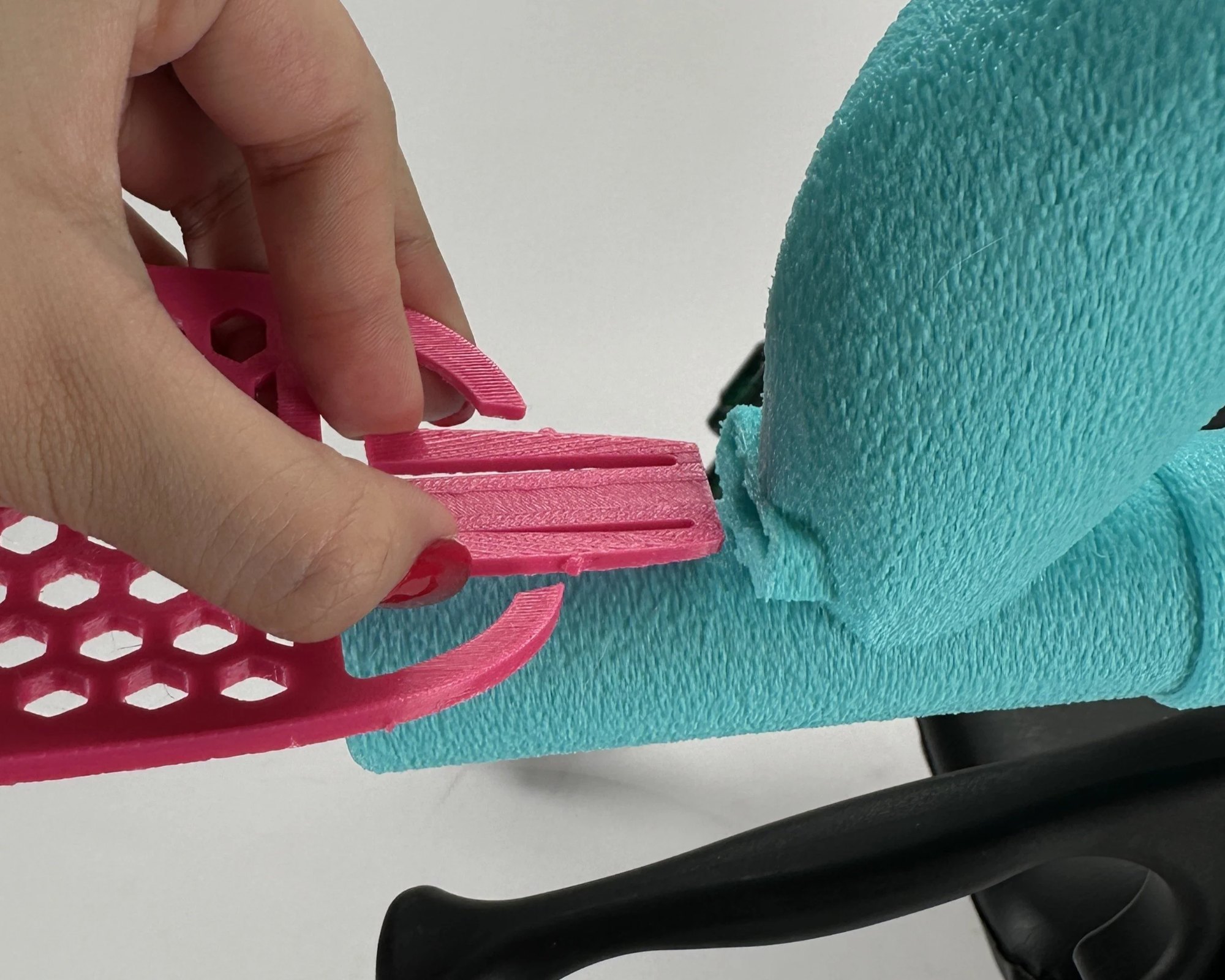 Wrist rest compliant mechanism fixing